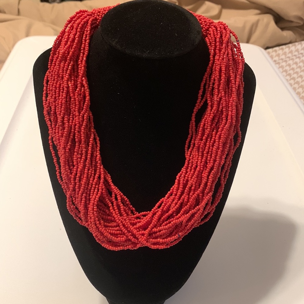 Gorgeous red twisted bead necklace.